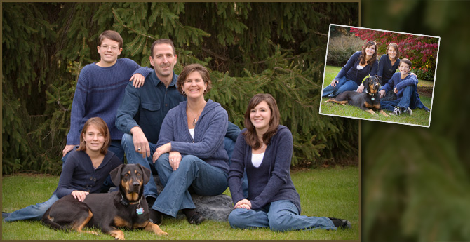 Professional family photography in a grassy outdoor Grandville, Michigan setting