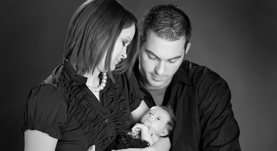New family's first family photo - Couple with newborn baby